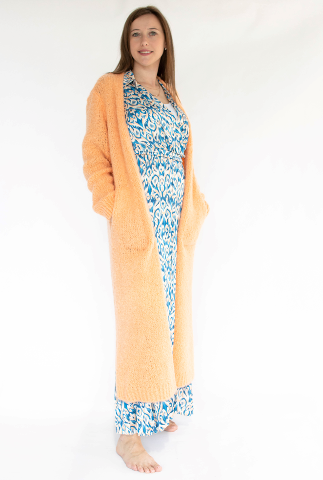 Lange vest peach kleur